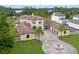 Luxury estate with circular driveway and fountain at 5251 Carson St, St Cloud, FL 34771