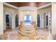 Luxurious bathroom with a large soaking tub and walk-in shower at 5251 Carson St, St Cloud, FL 34771