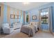 Charming bedroom with a twin-size bed and light blue walls at 5251 Carson St, St Cloud, FL 34771
