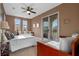 Spacious bedroom with double bed, daybed, and private balcony access at 5251 Carson St, St Cloud, FL 34771