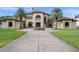 Luxury home with three-car garage and fountain at 5251 Carson St, St Cloud, FL 34771