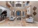 Elegant living room featuring high ceilings, a fireplace and ample seating at 5251 Carson St, St Cloud, FL 34771