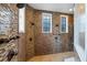Large walk-in shower with multiple shower heads at 5251 Carson St, St Cloud, FL 34771