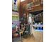 Colorful and eclectic dining area with various artwork and plants at 5302 Burning Tree Dr # F-02-2, Orlando, FL 32811