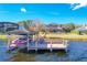 Spacious boat dock with covered area, offering convenient lake access at 632 Long Lake Dr, Oviedo, FL 32765