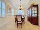 Formal dining room with a large table and china cabinet at 632 Long Lake Dr, Oviedo, FL 32765