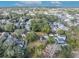 Aerial view of a residential area with large lots and mature trees at 747 Mcintyre Ave, Winter Park, FL 32789