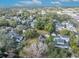 Aerial lot view showing a house nestled among other homes and trees at 747 Mcintyre Ave, Winter Park, FL 32789