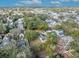 An aerial view of a residential lot in a tree-lined neighborhood at 747 Mcintyre Ave, Winter Park, FL 32789
