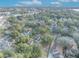 Aerial view showing home and neighborhood; desirable location, tree-lined streets at 747 Mcintyre Ave, Winter Park, FL 32789