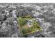 Lot view showing house nestled amongst mature trees at 747 Mcintyre Ave, Winter Park, FL 32789