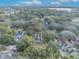 Aerial view showing home and neighborhood; desirable location, tree-lined streets at 747 Mcintyre Ave, Winter Park, FL 32789