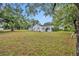 Large backyard with mature trees, adjacent to home at 747 Mcintyre Ave, Winter Park, FL 32789