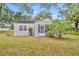 Cute one-story house with a spacious lawn at 747 Mcintyre Ave, Winter Park, FL 32789