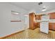 Retro kitchen with wood cabinets and island at 747 Mcintyre Ave, Winter Park, FL 32789