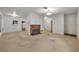 Living room with fireplace and access to other rooms at 747 Mcintyre Ave, Winter Park, FL 32789