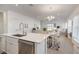 Open concept kitchen with island and stainless steel appliances at 7518 Sw 77Th Ave, Ocala, FL 34481