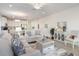 Open concept living room with kitchen and dining area at 7518 Sw 77Th Ave, Ocala, FL 34481