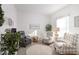 Bright sitting room with two armchairs and a leather recliner at 7518 Sw 77Th Ave, Ocala, FL 34481