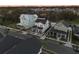 Aerial view of houses on a tree-lined street at sunset at 1175 Celadon St, Oakland, FL 34787