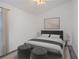 Stylish bedroom with a king-size bed and decor at 119 Rockhill Dr, Sanford, FL 32771