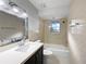 Clean bathroom with bathtub and updated vanity at 1319 N Old Mill Dr, Deltona, FL 32725