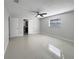 Spacious bedroom with tile floors and en-suite bathroom at 1319 N Old Mill Dr, Deltona, FL 32725