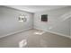 Well-lit bedroom with two windows and tile floors at 1319 N Old Mill Dr, Deltona, FL 32725