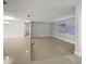 Bright living room with tile floors and large windows at 1319 N Old Mill Dr, Deltona, FL 32725
