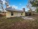 Backyard with screened patio and open space at 1350 Bailey Ave, Deltona, FL 32725