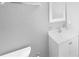 Simple bathroom with white vanity and fixtures at 1350 Bailey Ave, Deltona, FL 32725