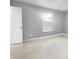 Bright bedroom with neutral walls and tile floors at 1350 Bailey Ave, Deltona, FL 32725
