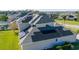 House with extensive solar panels on the roof at 14039 Hampshire Bay Cir, Winter Garden, FL 34787