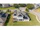 Aerial view of home with solar panels on the roof at 14039 Hampshire Bay Cir, Winter Garden, FL 34787