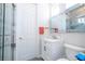 Clean bathroom with a white vanity and large mirror at 14039 Hampshire Bay Cir, Winter Garden, FL 34787