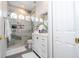 Modern bathroom with marble shower and vanity at 14039 Hampshire Bay Cir, Winter Garden, FL 34787
