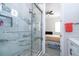 Bathroom with a large walk-in shower and marble tile at 14039 Hampshire Bay Cir, Winter Garden, FL 34787