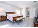 Spacious bedroom with king-size bed and en-suite bathroom at 14039 Hampshire Bay Cir, Winter Garden, FL 34787