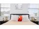Bedroom with a tan colored bed and two night stands at 14039 Hampshire Bay Cir, Winter Garden, FL 34787