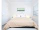 Serene bedroom featuring a beige duvet and soft lighting at 14039 Hampshire Bay Cir, Winter Garden, FL 34787