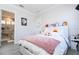 Cozy bedroom with plush bedding and en-suite bathroom at 14039 Hampshire Bay Cir, Winter Garden, FL 34787