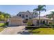 Beautiful two-story home featuring an attached two-car garage and meticulously designed curb appeal at 14039 Hampshire Bay Cir, Winter Garden, FL 34787