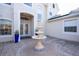 Elegant home exterior featuring a fountain and meticulously landscaped courtyard at 14039 Hampshire Bay Cir, Winter Garden, FL 34787