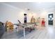 Game room with ping pong table and media area at 14039 Hampshire Bay Cir, Winter Garden, FL 34787