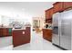 Open kitchen with stainless steel appliances and island at 14039 Hampshire Bay Cir, Winter Garden, FL 34787