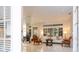 Bright living room with marble floors and comfortable seating at 14039 Hampshire Bay Cir, Winter Garden, FL 34787