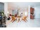 Open concept living area with comfortable seating and view to kitchen at 14039 Hampshire Bay Cir, Winter Garden, FL 34787