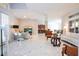 Open living area with comfortable seating and marble floors at 14039 Hampshire Bay Cir, Winter Garden, FL 34787