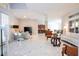 Bright and airy living room with marble floors and ample natural light at 14039 Hampshire Bay Cir, Winter Garden, FL 34787
