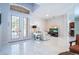 Spacious living room showcasing marble floors and a modern aesthetic at 14039 Hampshire Bay Cir, Winter Garden, FL 34787